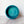 Geometric teal bowl on a light gray surface with a white background